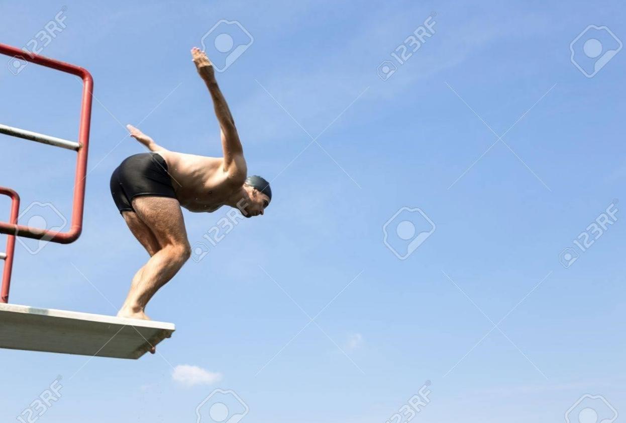 Perfect form: Soaring through the air with a graceful dive 